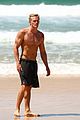 cody simpson shirtless beach cleanup 02