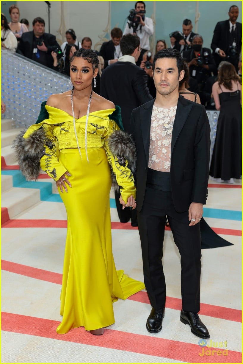 Ariana DeBose Holds Hands with Designer Joseph Altuzarra While Arriving