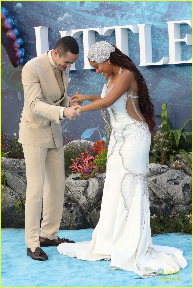 Full Sized Photo of halle bailey hugs adorable little girl at little