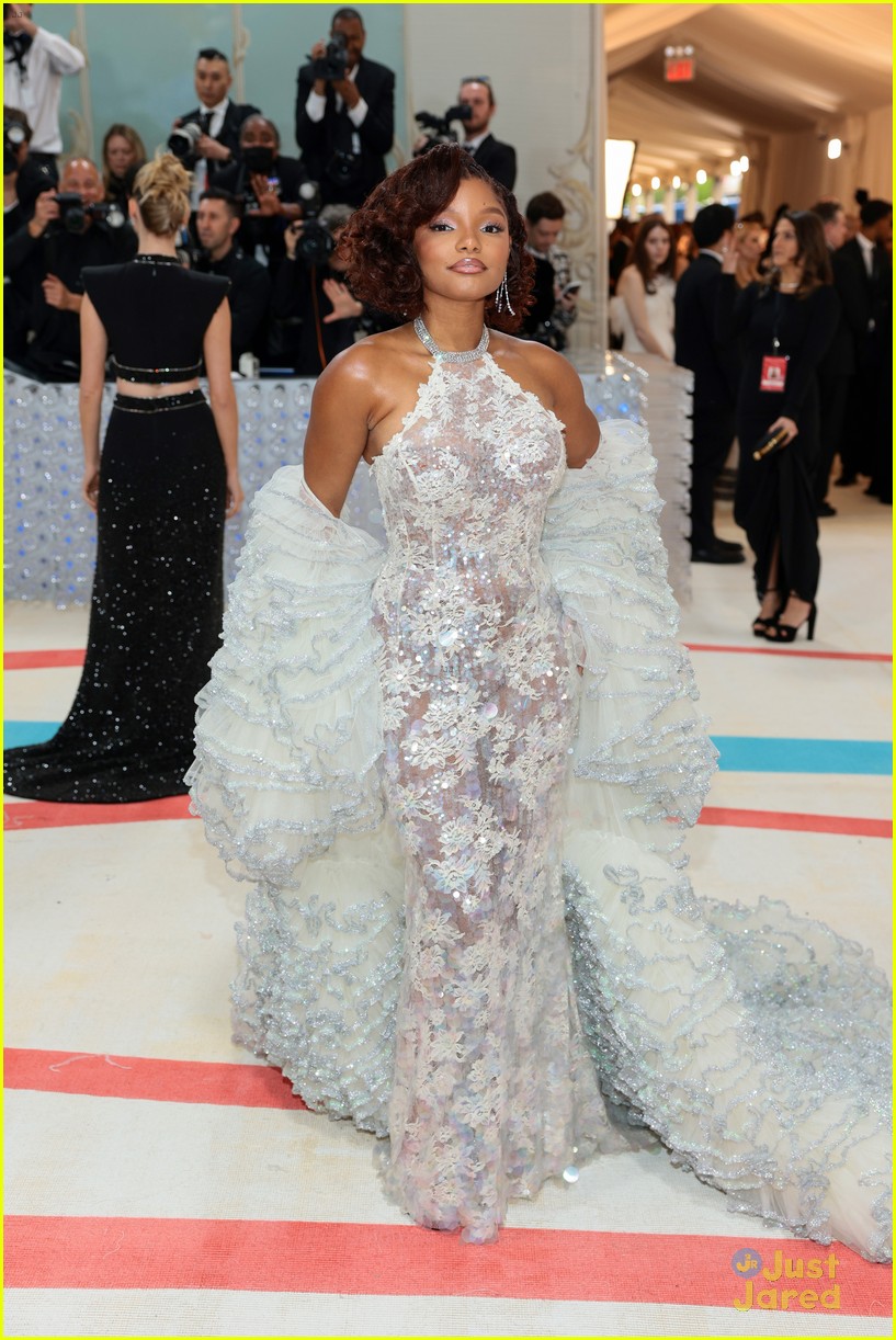 Full Sized Photo of halle bailey is vision in white at met gala ahead