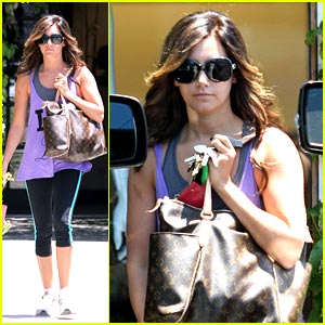 ashley tisdale wears a louis vuitton fanny pack, grey t-shirt and