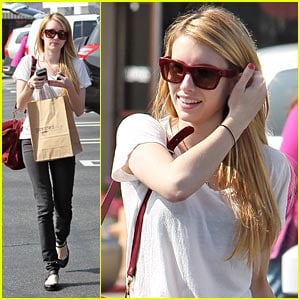 Emma Roberts grabs coffee with a friend while rocking her controversial Moschino  pill pack handbag
