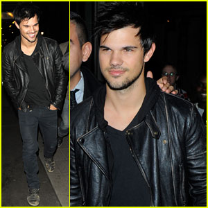 Taylor Lautner Cracks Up with Friends While Out in London