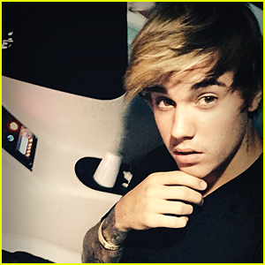 Justin Bieber Sports His Trademark Hairstyle