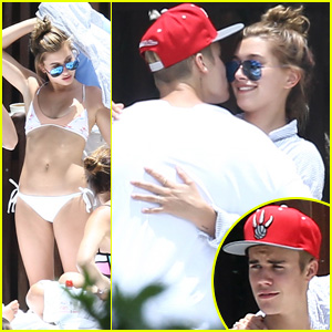 Justin Bieber Plants a Kiss on Pal Hailey Baldwin Poolside in Miami