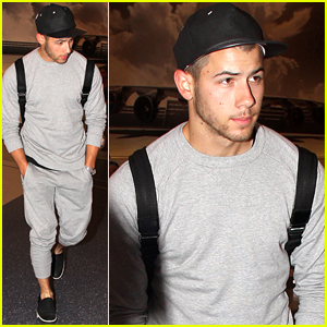 Nick Jonas Dresses Down For Flight To Dominican Republic