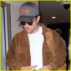 Robert Pattinson Gets Ready to Hop on a Plane Out of LAX Airport