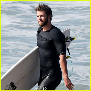 Liam Hemsworth Rocks a Wetsuit While Surfing