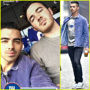Joe & Kevin Jonas Take in New York Giants Game With Friends & Family!