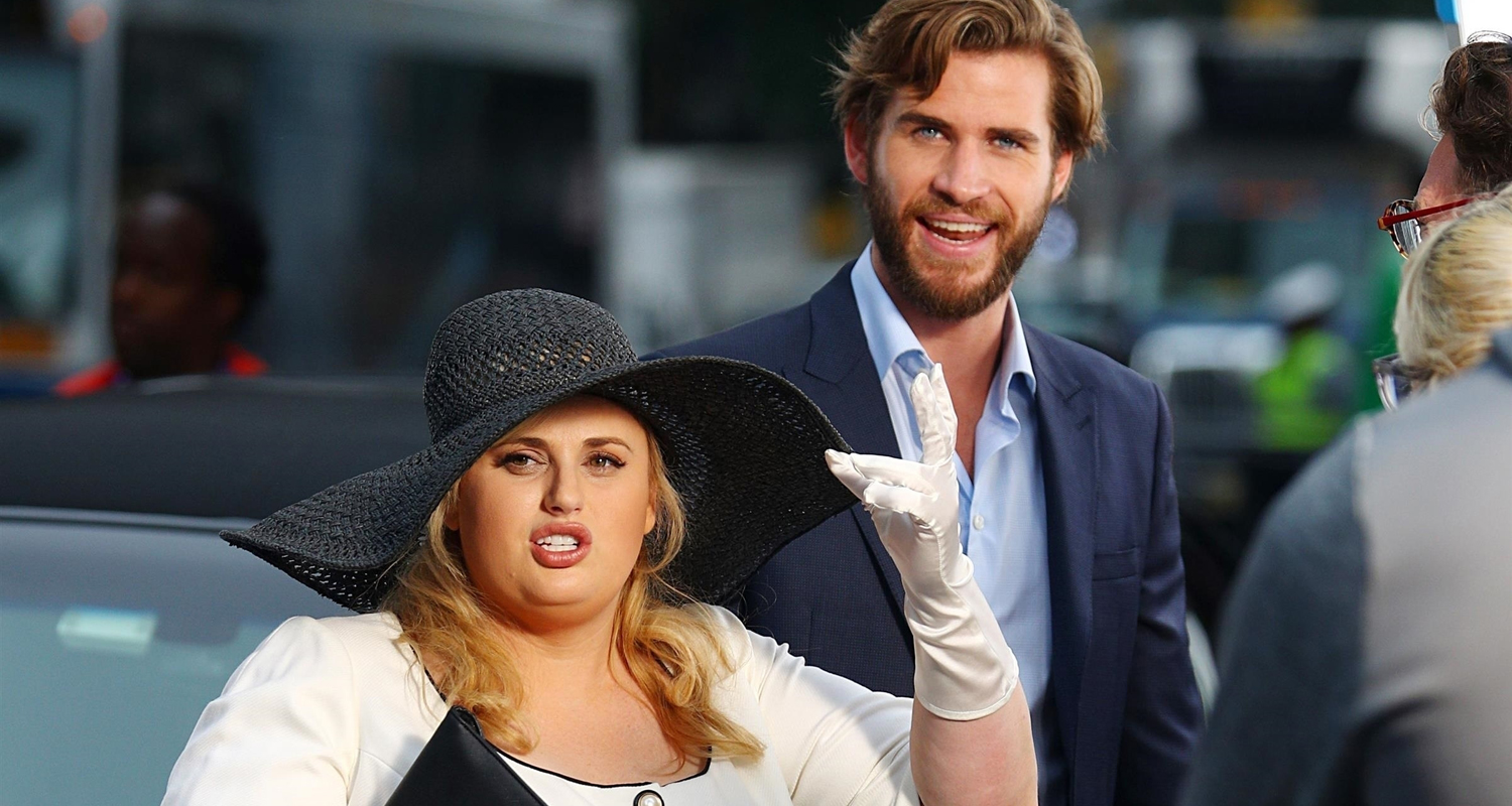 Liam Hemsworth Almost Hits Rebel Wilson While Filming ‘Isn’t It
