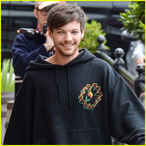 Louis Tomlinson in a oversized hoodie. It's not a question but you
