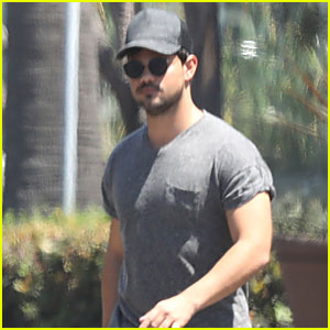 Taylor Lautner Does Back Flip Into Pool Fully Clothed