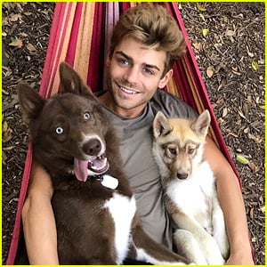 Garrett Clayton Cuddles With His Pups & We Can't Handle the Cuteness