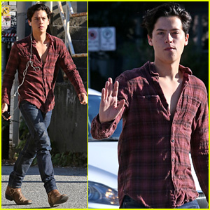 Cole Sprouse Dreamily Waves to Fans While Walking Down the Street