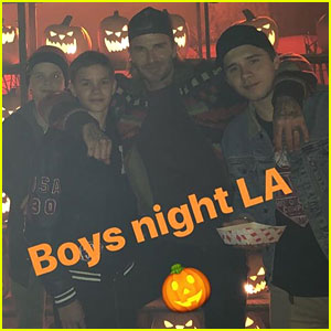 David Beckham enjoys a boys' night out with son Romeo at the Los