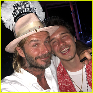 David Beckham enjoys a boys' night out with son Romeo at the Los