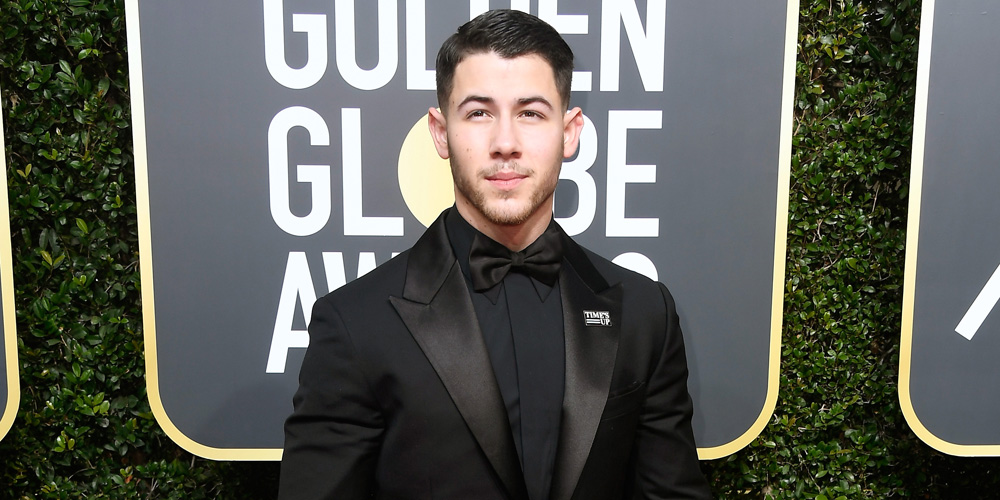 Nick Jonas Gives His Golden Globes Tux a Western Twist with a