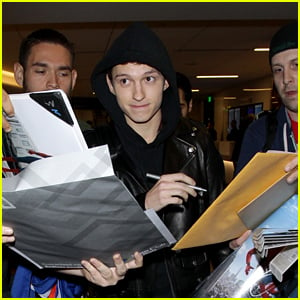 Tom Holland Gets Swarmed by Fans While Arriving at the Airport!