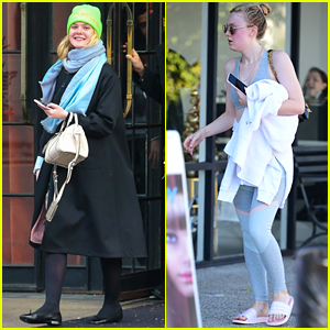 Dakota Fanning flashes her black bra under white shirt in New York