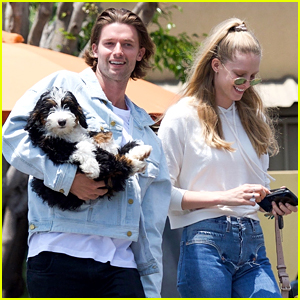 Patrick Schwarzenegger Cradles Adorable Puppy In His Arms After Lunch With Abby Champion
