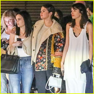 Selena Gomez Keeps Warm For Night Out with Friends