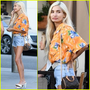 Singer Pia Mia Styles Her Tracksuit with Pearls and LV