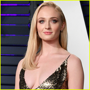 Sophie Turner Turns a T-Shirt Into a Dress in Sheer Tights & Sneakers –  Footwear News