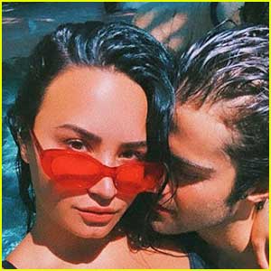 Demi Lovato & Max Ehrich Cuddle Up In The Pool In New Photos