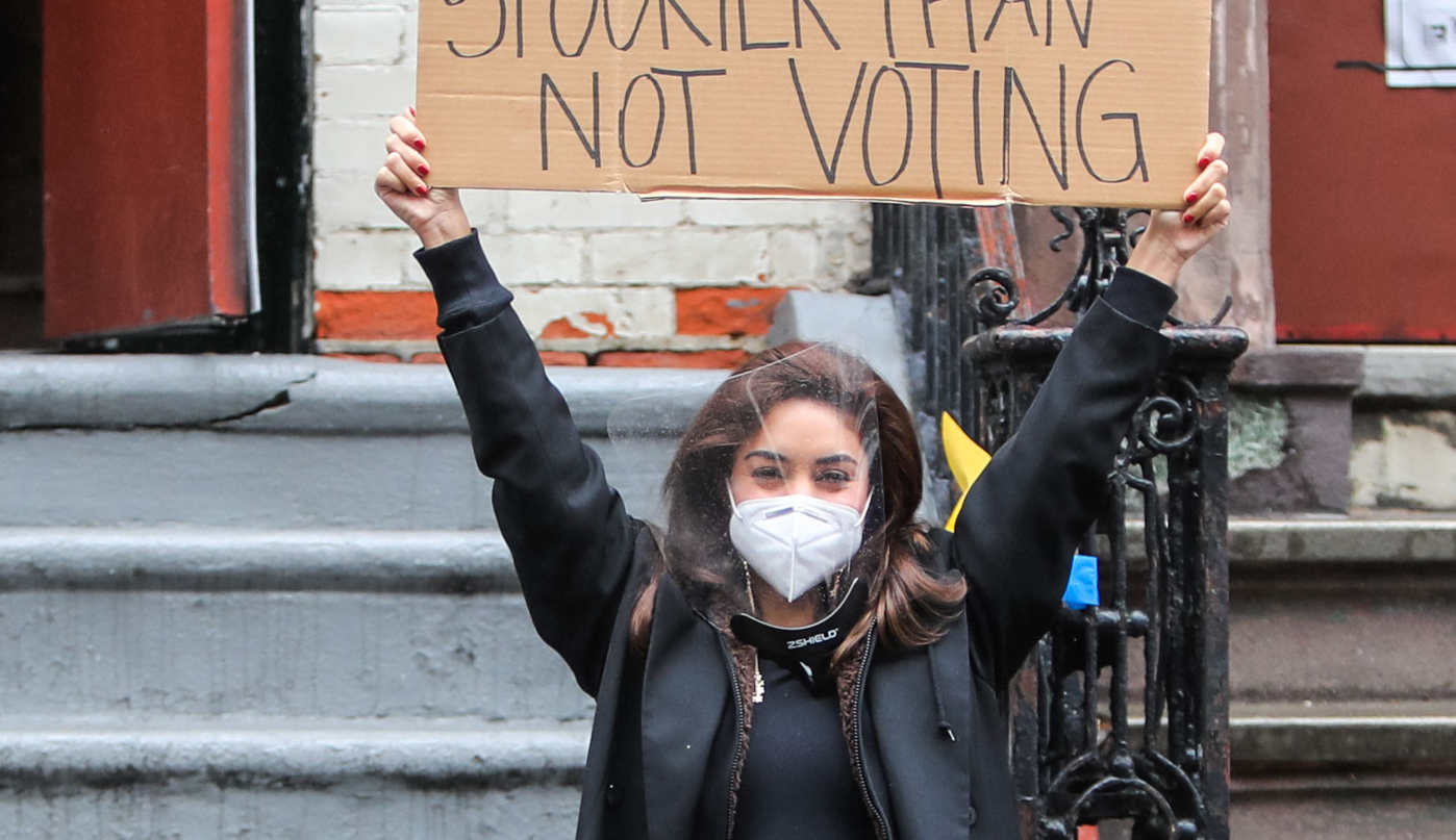 vanessa-hudgens-sends-her-voting-message-with-help-from-dude-with-sign