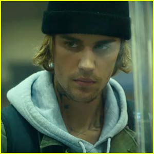 Justin Bieber Robs a Bank & Gets Into a Motorcycle Chase in 'Hold On' Video