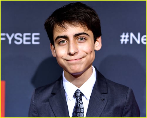 Aidan Gallagher Poses on a red carpet, dream casting for Percy Jackson series