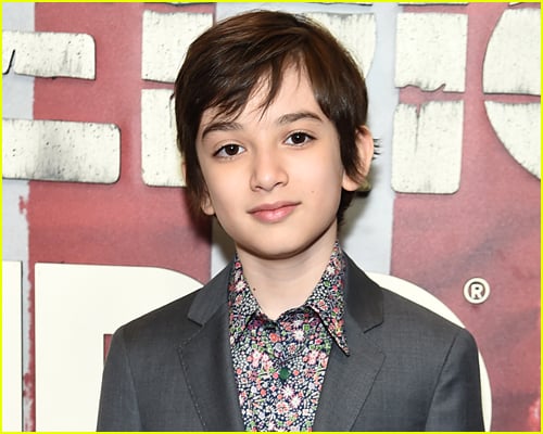 Azhy Robertson Poses on a red carpet, dream casting for Percy Jackson series