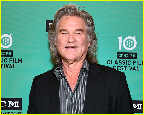 Kurt Russell poses for a photo at a red carpet event