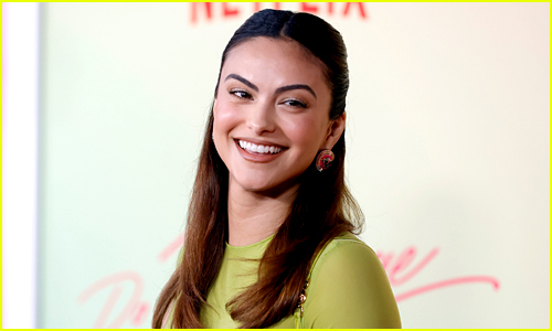 Camila Mendes smiles on the carpet at her Do Revenge premiere