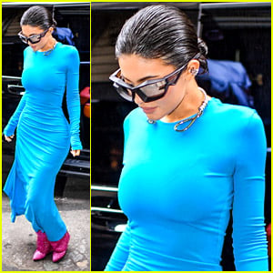 Kylie Jenner Changes Into A Stunning Bright Blue Dress For Lunch in Paris Following Lion Head Dress Debate