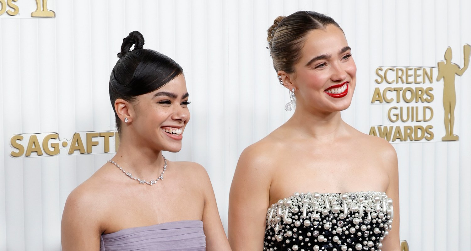 Sag Ambassadors Haley Lu Richardson And Antonia Gentry Hold Hands While