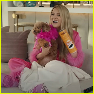 Meghan Trainor Pets Her Dog with a Pringles Can Stuck On Her Hand in Super Bowl Ad - Watch Now!