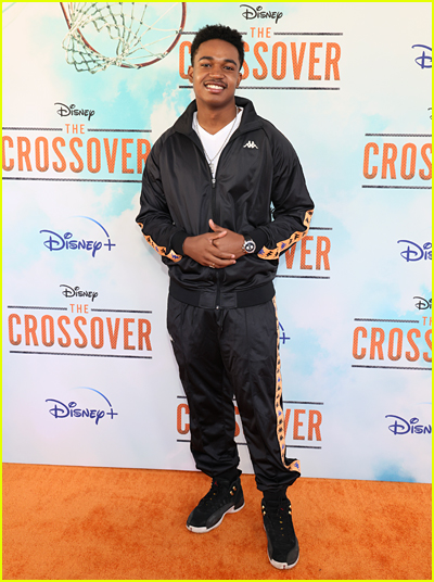 Issac Ryan Brown on the orange carpet at the The Crossover premiere