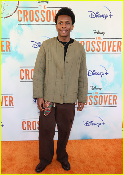 Israel Johnson on the orange carpet at the The Crossover premiere